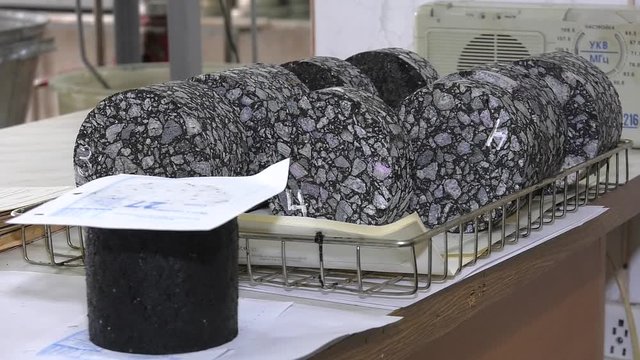Form coring asphalt concrete paving road.  Indirect Tensile Test