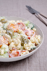 Salad with pasta and raw vegetables