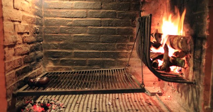 Traditional Uruguyan parilla burning