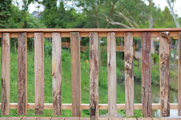 Wooden of planks fence in the garden.