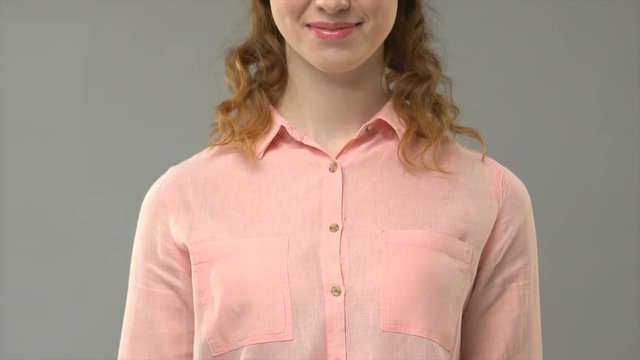 Woman saying i apologize in sign language teacher showing words in asl lesson