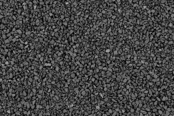 Black (gray) small crushed stones background texture