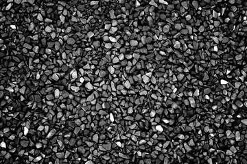 Black (gray) small crushed stones background texture