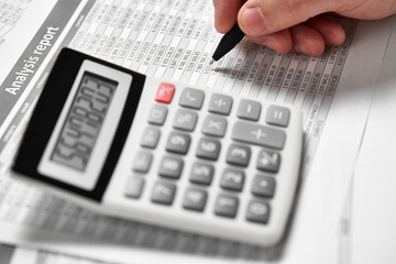 Businessman working and calculating finance. Business financial accounting concept. Closeup hands.