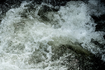 running of water stream from waterfall in tropical rain forest