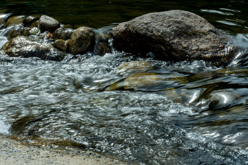 running of water stream from waterfall in tropical rain forest