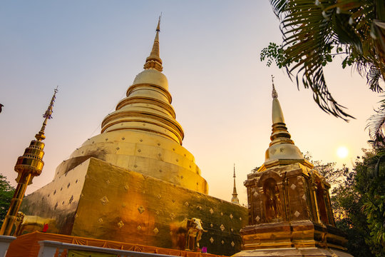 golden pagada in old temple of Chiang Mai city, Thailand during beautiful sunlight 