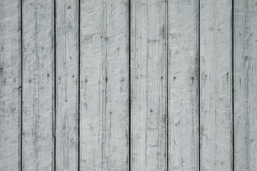 Old wooden fence covered with light gray paint. For design, banner and layout.