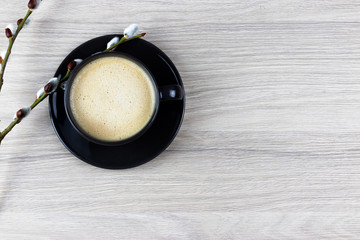 Coffee with flower on the wooden grey texture