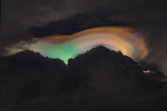 iridescent pileus or rainbow clouds in the sky