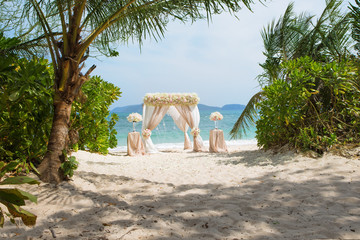 view of wedding decoration on  tropical summer beach 
