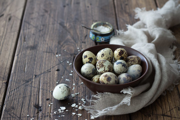 Boiled quail eggs on a wooden table