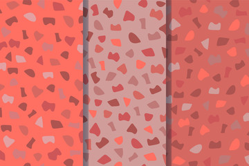 Set of three terrazzo seamless patterns. The vector illustration is made in fashionable colors of 2019. Pattern ideal for wrapping paper, wallpaper, terrazzo flooring. EPS10