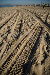 Tire tracks on the beach