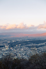 Sunset and evening city Tbilisi, Georgia. Panoramic views and lights of historic neighborhoods.