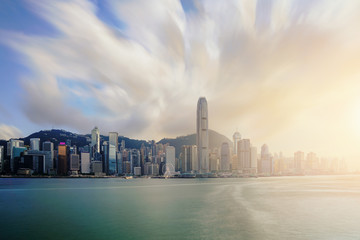 Obraz premium View of Victoria Harbour with Hong Kong skyscraper office buildings at sunset time in Hong Kong. Asia.