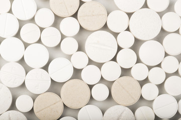 white tablets close up background on white desk - Image