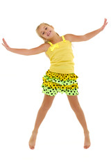 Little girl is jumping.