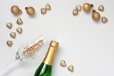Christmas or New Year composition with bottle of champagne