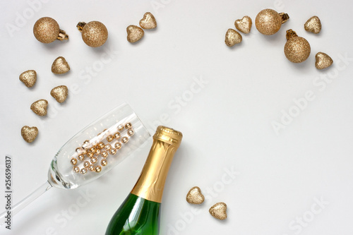 Christmas or New Year composition with bottle of champagne