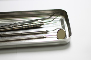 dental instruments close-up in the tray