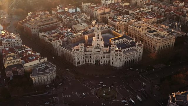 Madrid with its famous Palacio de Cibeles at the Plaza de Cibeles in an aerial shot. 