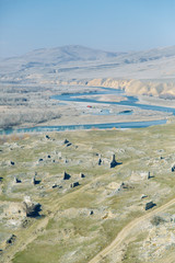 Fototapeta premium Rivers and mountains on beautiful views in Gori. Nature of Georgia on the panorama.