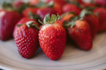 Strawberries background. Close up view of fresh and juicy strawberries as background. 