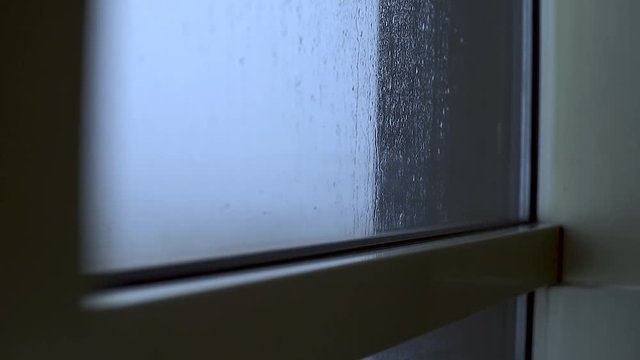 faster raindrops hit window