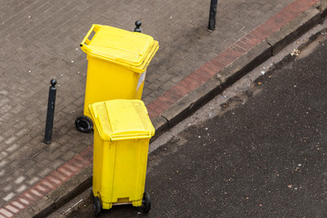 Plastic wheely bins in the street outside