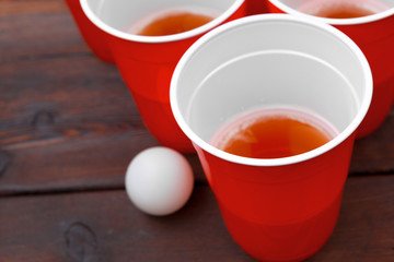 Cups for game Beer Pong on the table