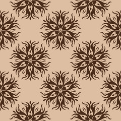 Brown flowers on beige background. Seamless pattern