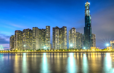 Ho Chi Minh City, Vietnam - February 21th, 2018: Skyscraper at sunset with impressive apartment, showing urban development with modern architecture to bring international in Ho Chi Minh City, Vietnam