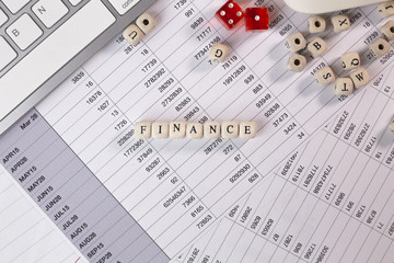 The finance word on wood cube business content image.