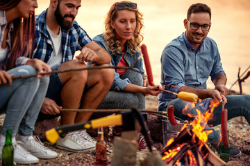 Friends grilling food