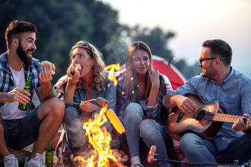 Group of friends grilling together