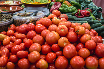 Stand with tomatoes in Livramento food market in Setubal town, Portugal