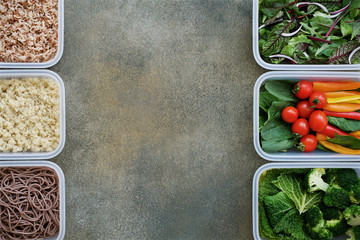  Vegan meal prep lunch box containers with quinoa, brown rice, buckwheat noodles, spinach, tomato, pepper, broccoli, savoy cabbage, lettuce, onions