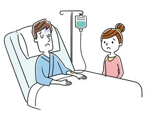 入院している若い男性と妻