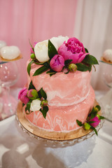 Wedding pink cake with flowers for wedding day.