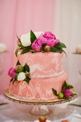 Wedding pink cake with flowers for wedding day.