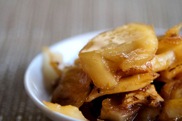 Sweet young coconut in sugar syrup in white dish, sweet dessert making from Thai local fruit, high sugar level that affect diabetes and  cause of many illness, and have space for write wording