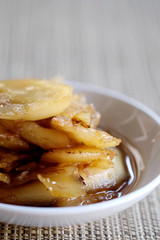 Sweet young coconut in sugar syrup in white dish, sweet dessert making from Thai local fruit, high sugar level that affect diabetes and  cause of many illness, and have space for write wording