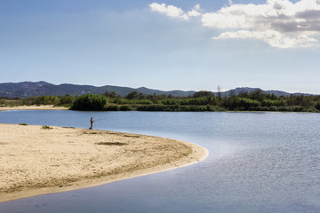 Fototapeta premium man fishing in the river