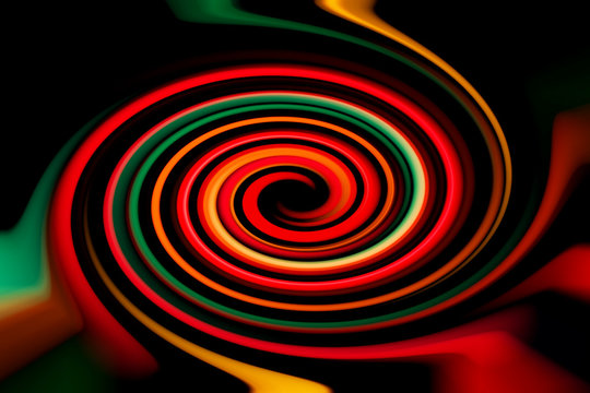 Blurred abstract background. Image of red, blue, green and yellow circles and wavy lines of different sizes. © queen1987