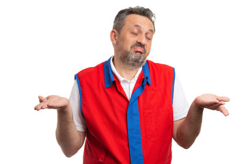 Ignorant hypermarket employee making gesture with palms.