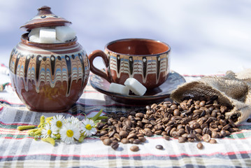 Coffee grinder, coffee beans and cups decoration