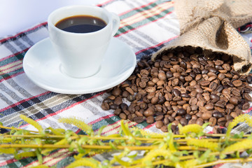 Coffee grinder, coffee beans and cups decoration