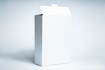 White generic box, studio shot. Blank carton food package, front view on white background