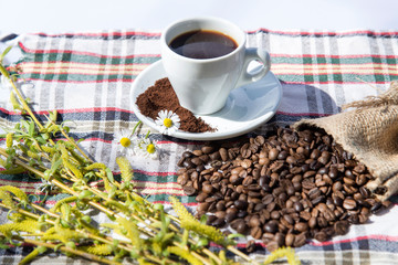 Coffee grinder, coffee beans and cups decoration